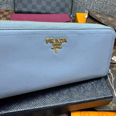 100% Authentic Prada Leather Wallet - Luxury Cheaper LLC