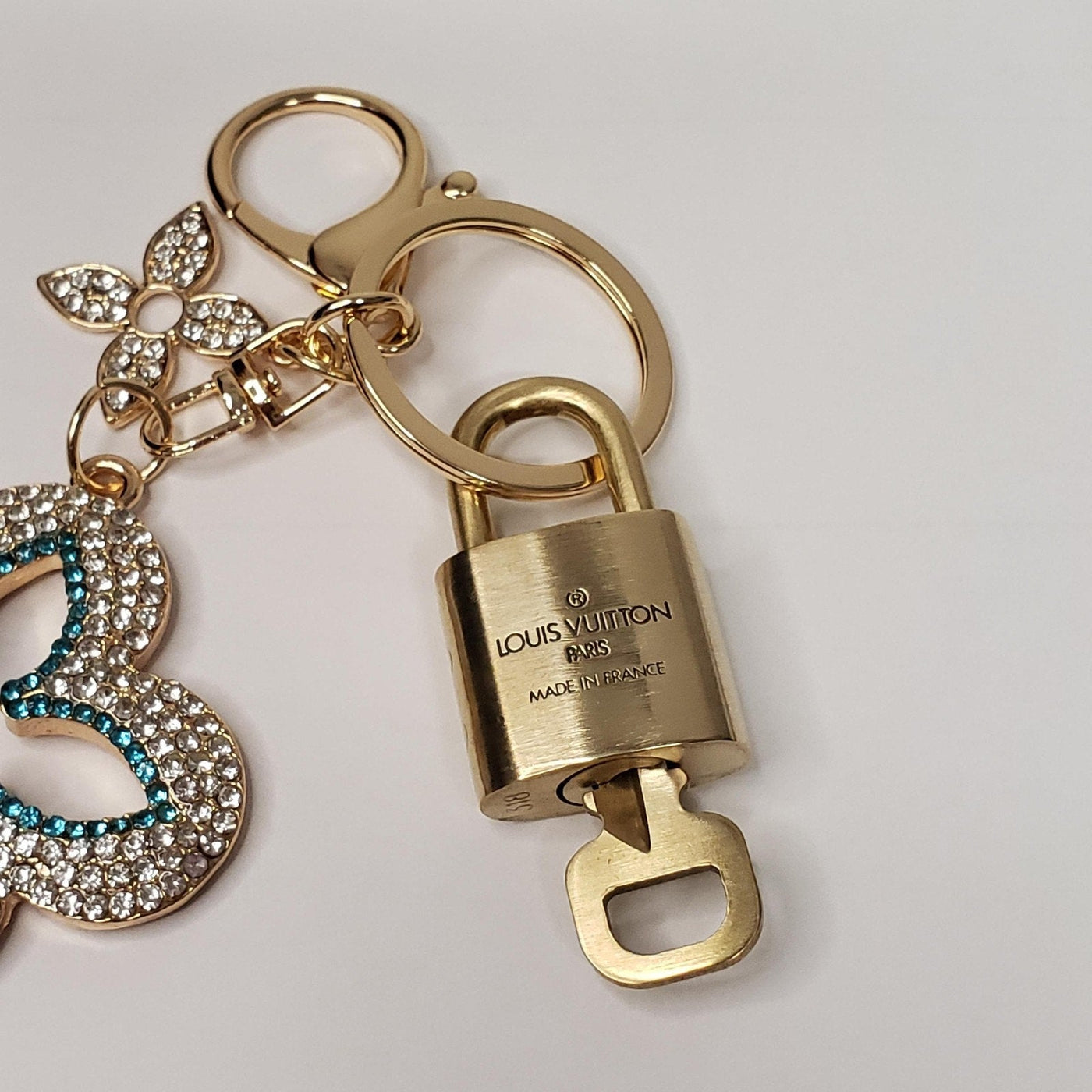 Authentic Louis Vuitton Lock & Key with Unbranded Flower Charm, Keychain 100725 - Luxury Cheaper LLC
