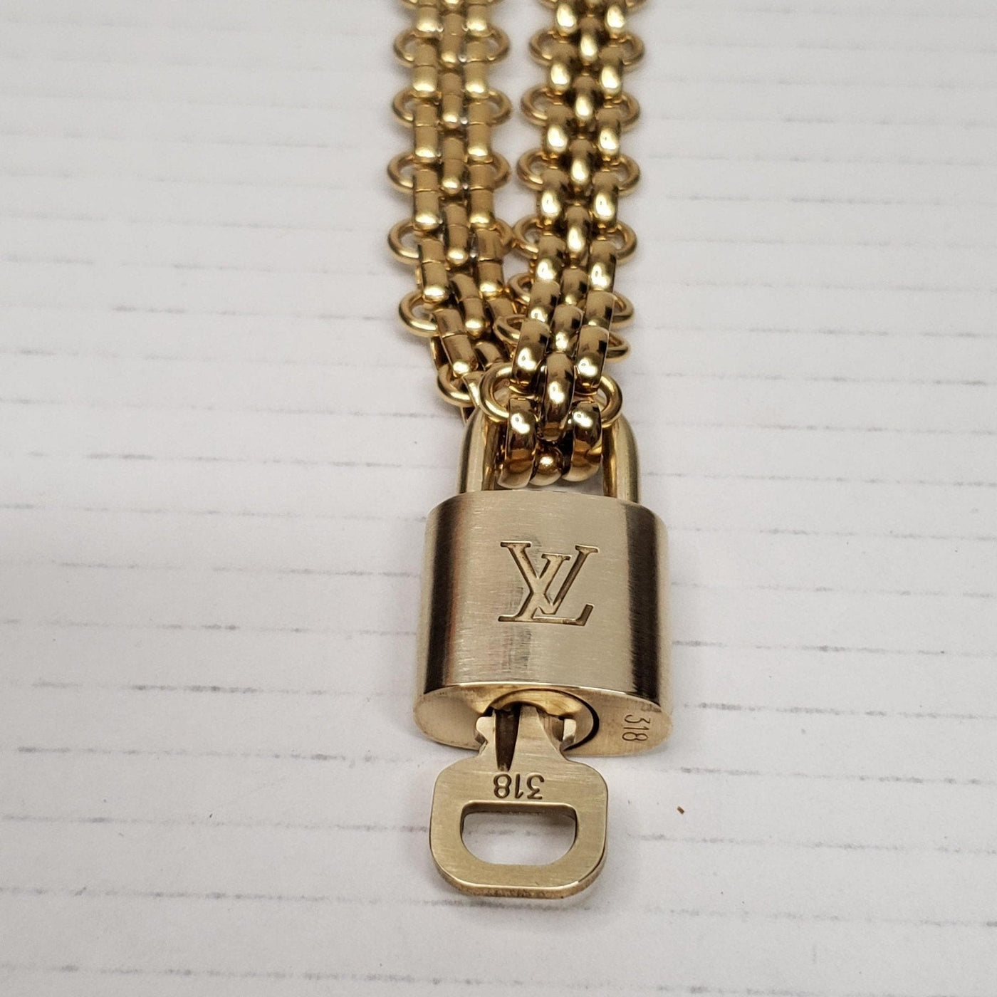 Authentic Louis Vuitton Lock & Key with Unbranded Stainless Steel Chain - Luxury Cheaper LLC