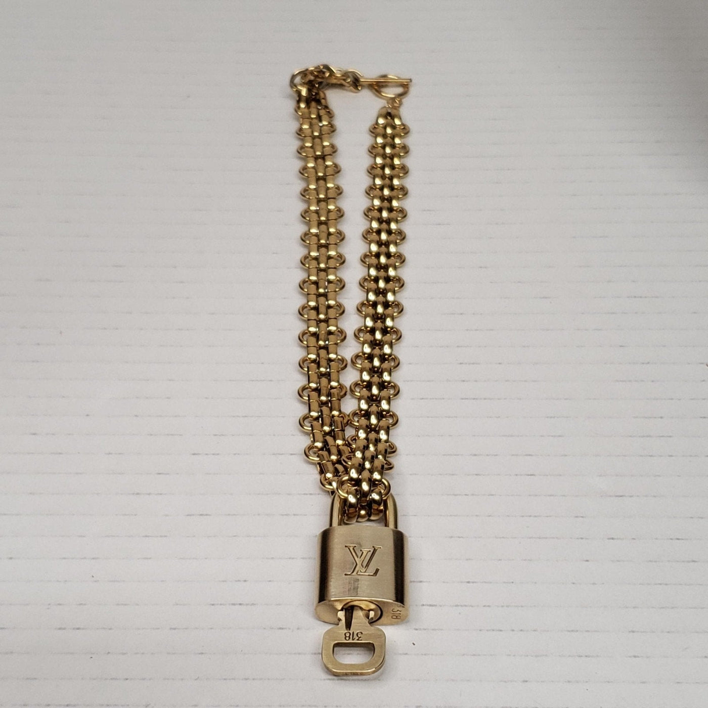 Authentic Louis Vuitton Lock & Key with Unbranded Stainless Steel Chain - Luxury Cheaper LLC