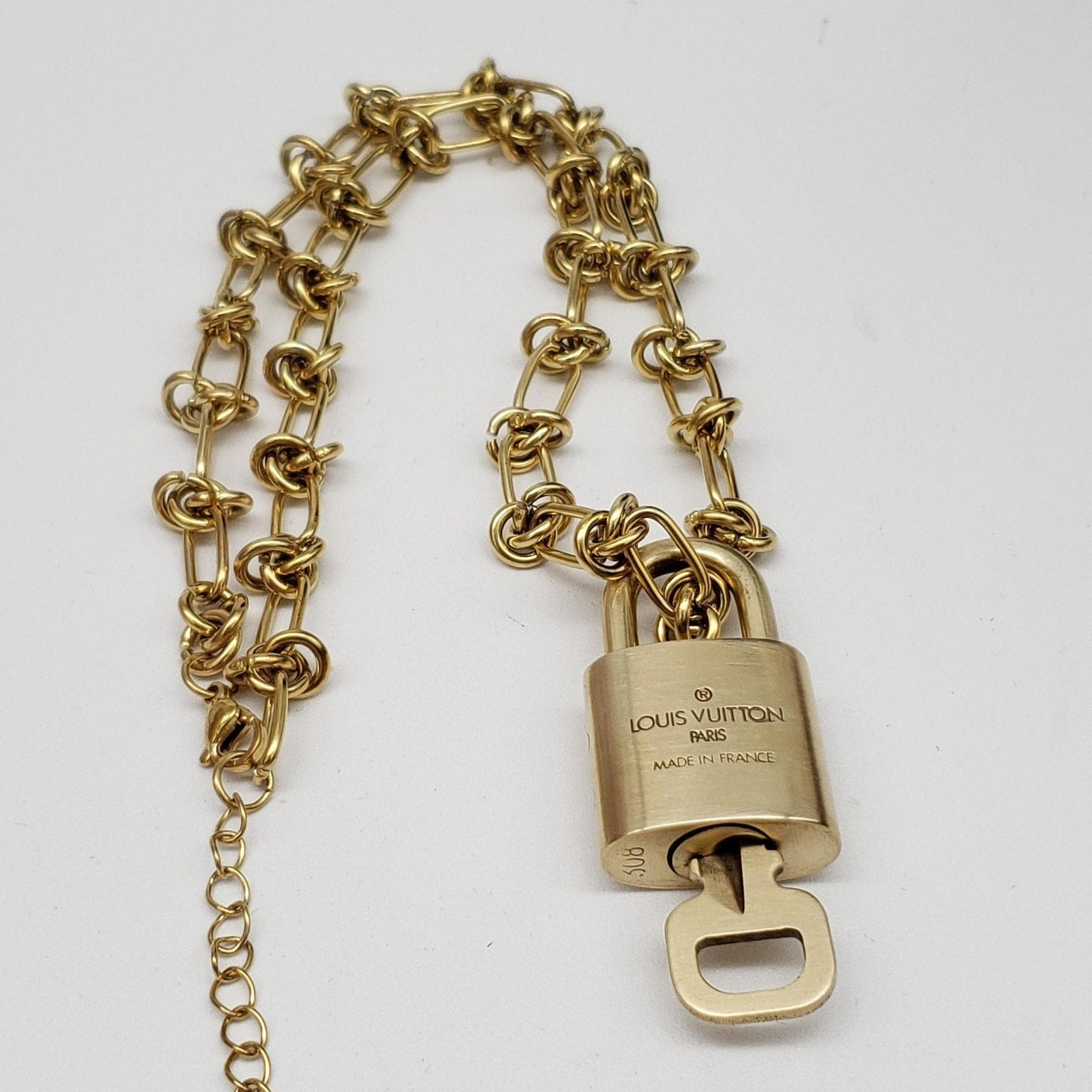 Louis Vuitton Gold Padlock w/ Unbranded Stainless Steel 18k Gold Plated Chain - Luxury Cheaper LLC