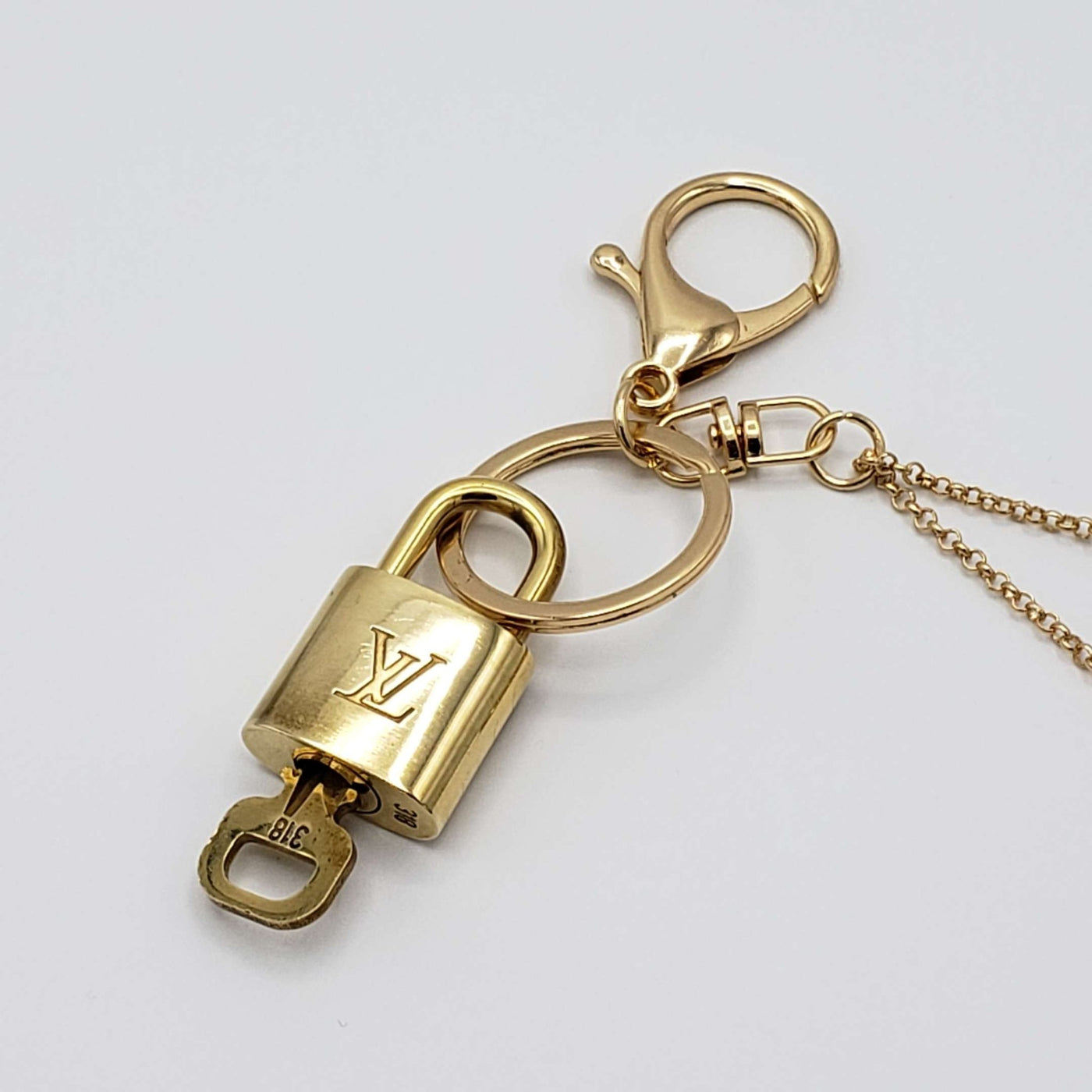Louis Vuitton Lock and Key Bag Charm or Keycharm - Luxury Cheaper